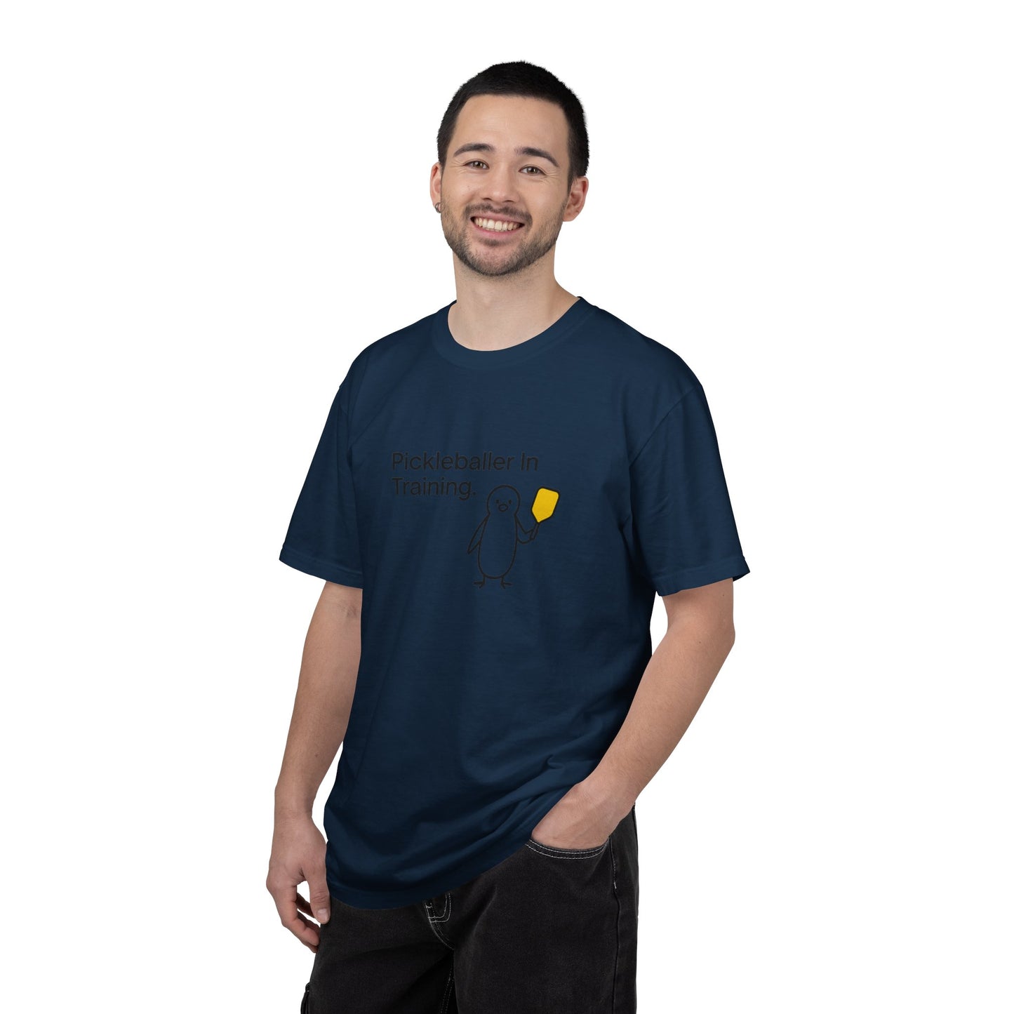 Pickleballer in Training T-Shirt | Cute Penguin Holding Paddle Design