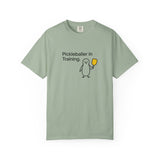 Pickleballer in Training T-Shirt | Cute Penguin Holding Paddle Design
