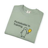 Pickleballer in Training T-Shirt | Cute Penguin Holding Paddle Design