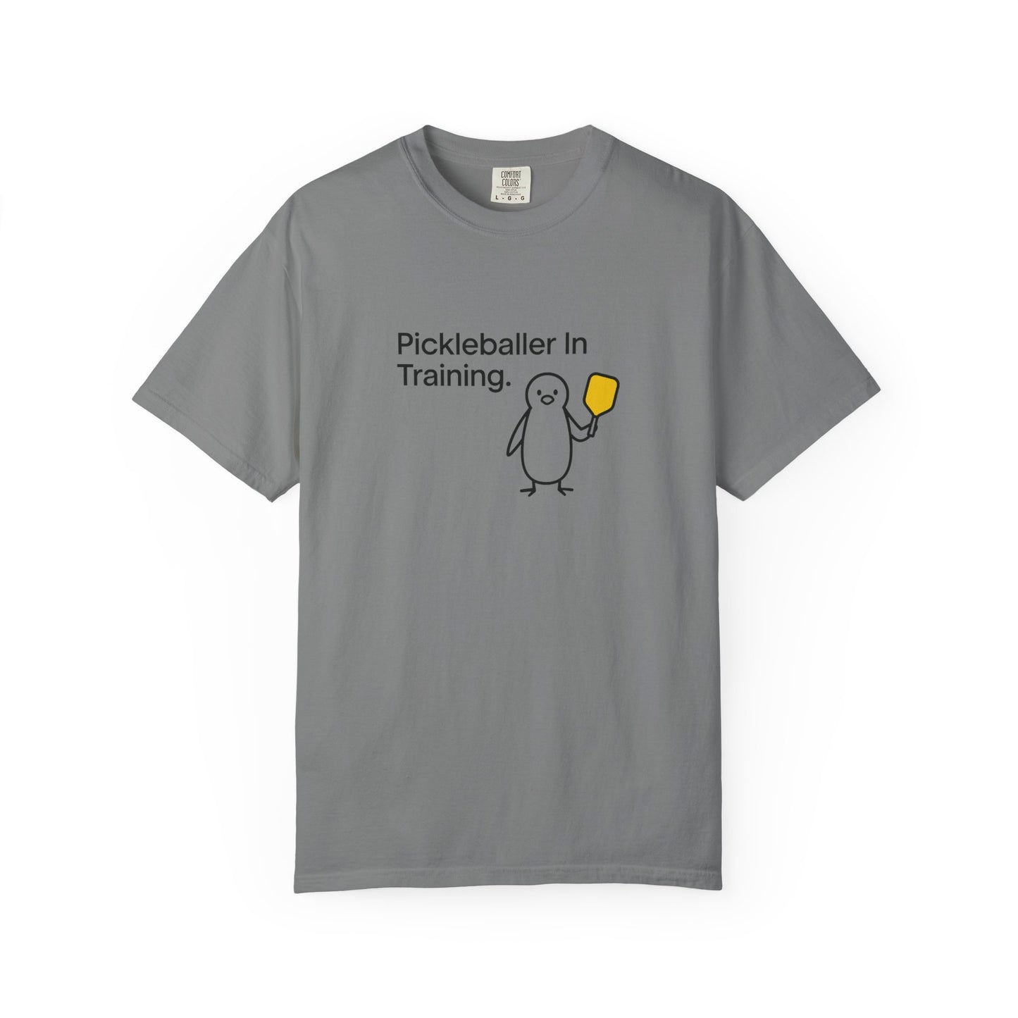 Pickleballer in Training T-Shirt | Cute Penguin Holding Paddle Design