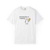 Pickleballer in Training T-Shirt | Cute Penguin Holding Paddle Design