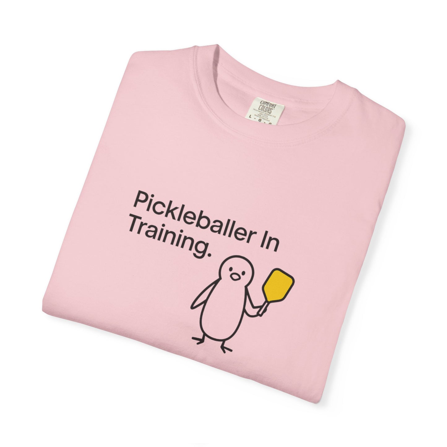 Pickleballer in Training T-Shirt | Cute Penguin Holding Paddle Design
