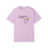 Pickleballer in Training T-Shirt | Cute Penguin Holding Paddle Design