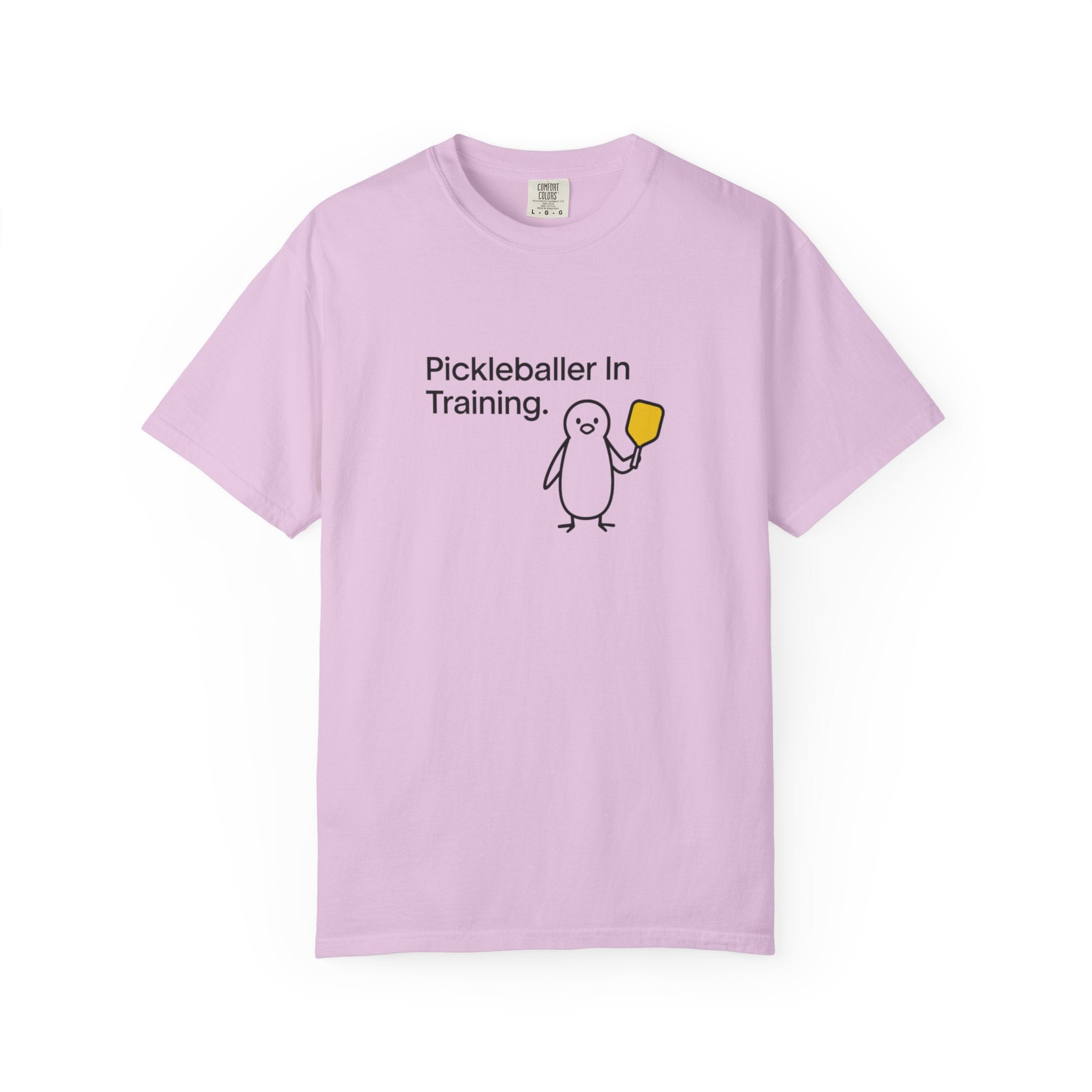 Pickleballer in Training T-Shirt | Cute Penguin Holding Paddle Design