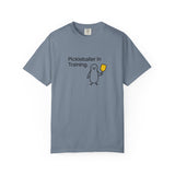 Pickleballer in Training T-Shirt | Cute Penguin Holding Paddle Design