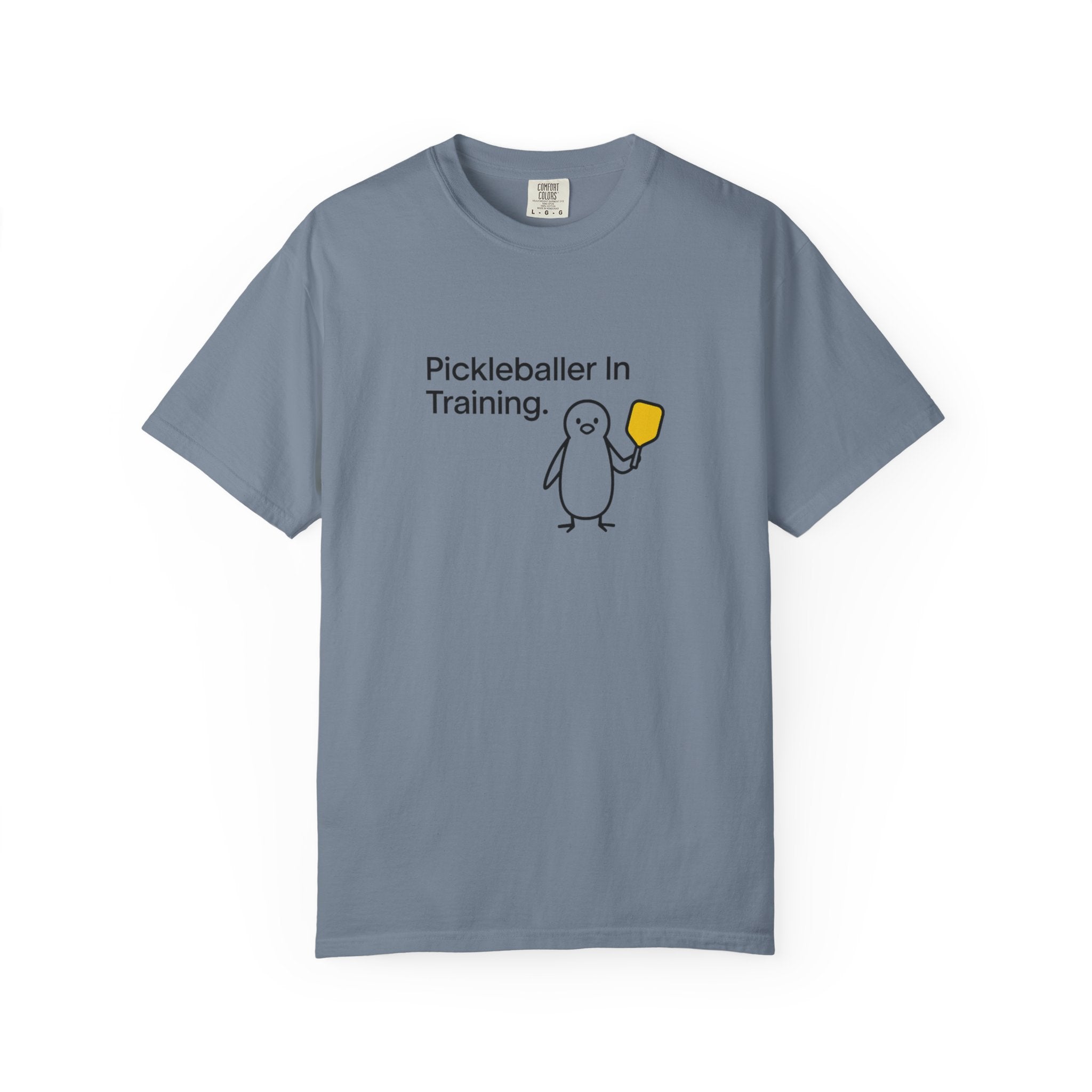 Pickleballer in Training T-Shirt | Cute Penguin Holding Paddle Design