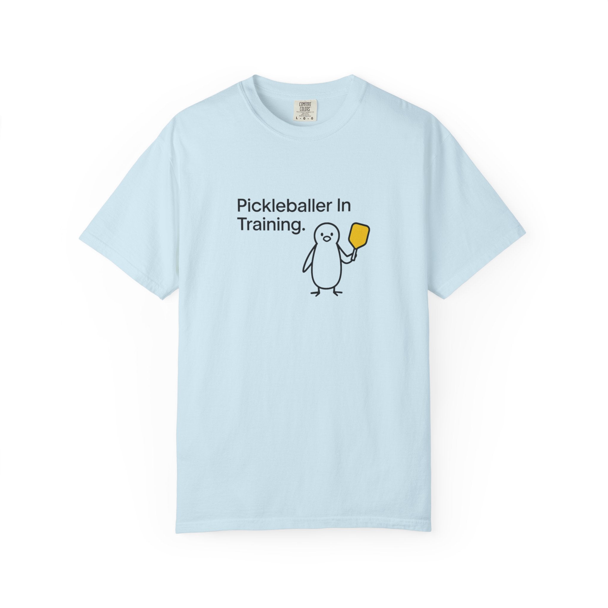 Pickleballer in Training T-Shirt | Cute Penguin Holding Paddle Design
