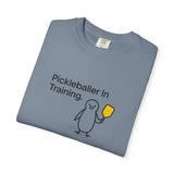 Pickleballer in Training T-Shirt | Cute Penguin Holding Paddle Design