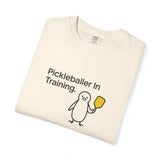 Pickleballer in Training T-Shirt | Cute Penguin Holding Paddle Design
