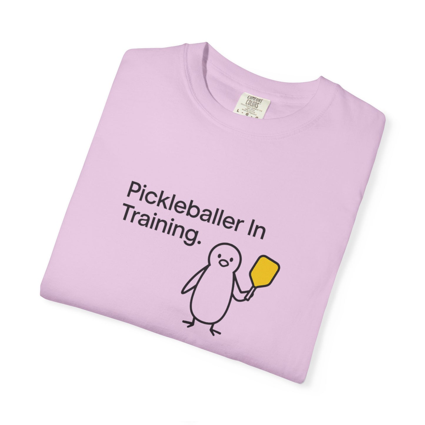 Pickleballer in Training T-Shirt | Cute Penguin Holding Paddle Design