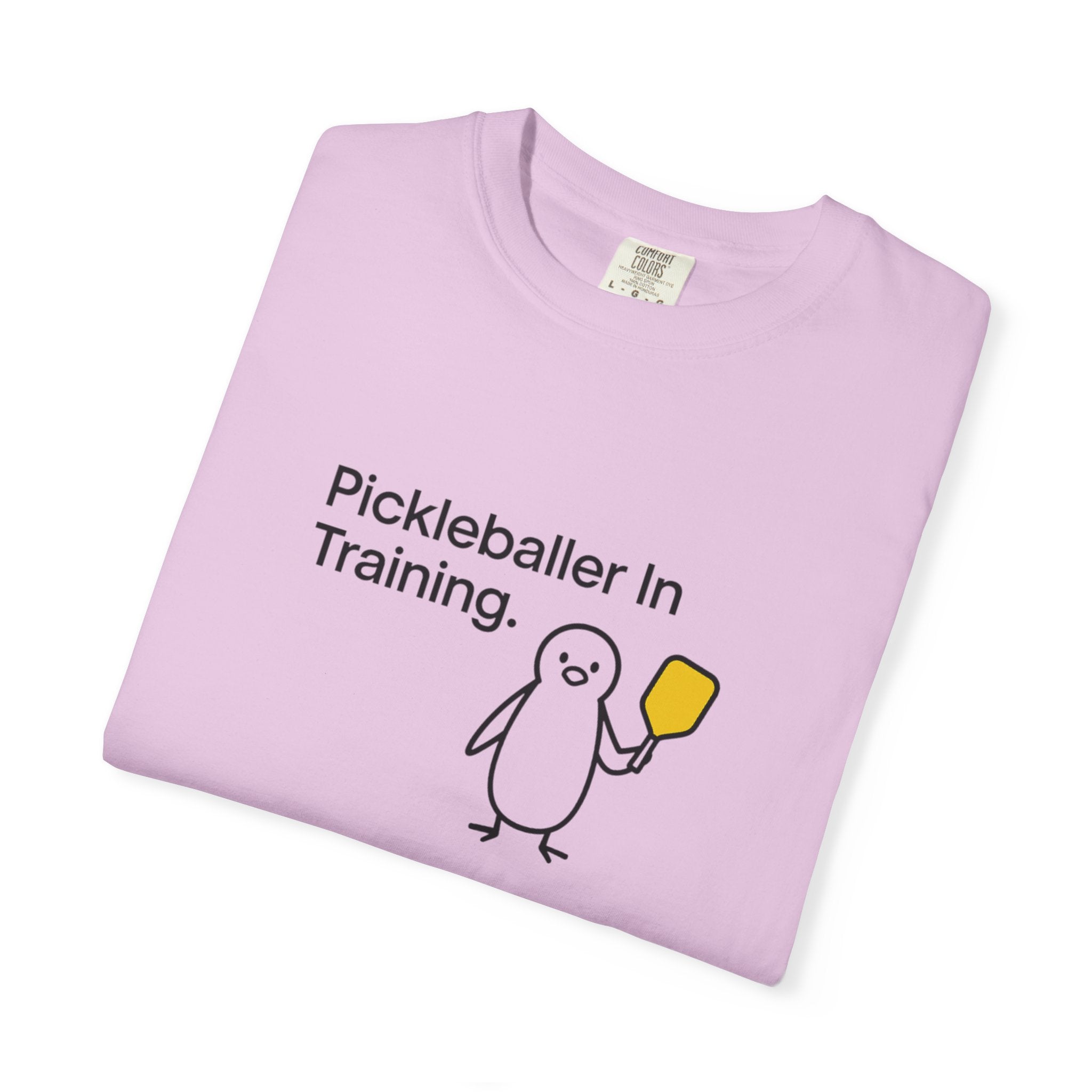 Pickleballer in Training T-Shirt | Cute Penguin Holding Paddle Design