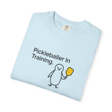 Pickleballer in Training T-Shirt | Cute Penguin Holding Paddle Design