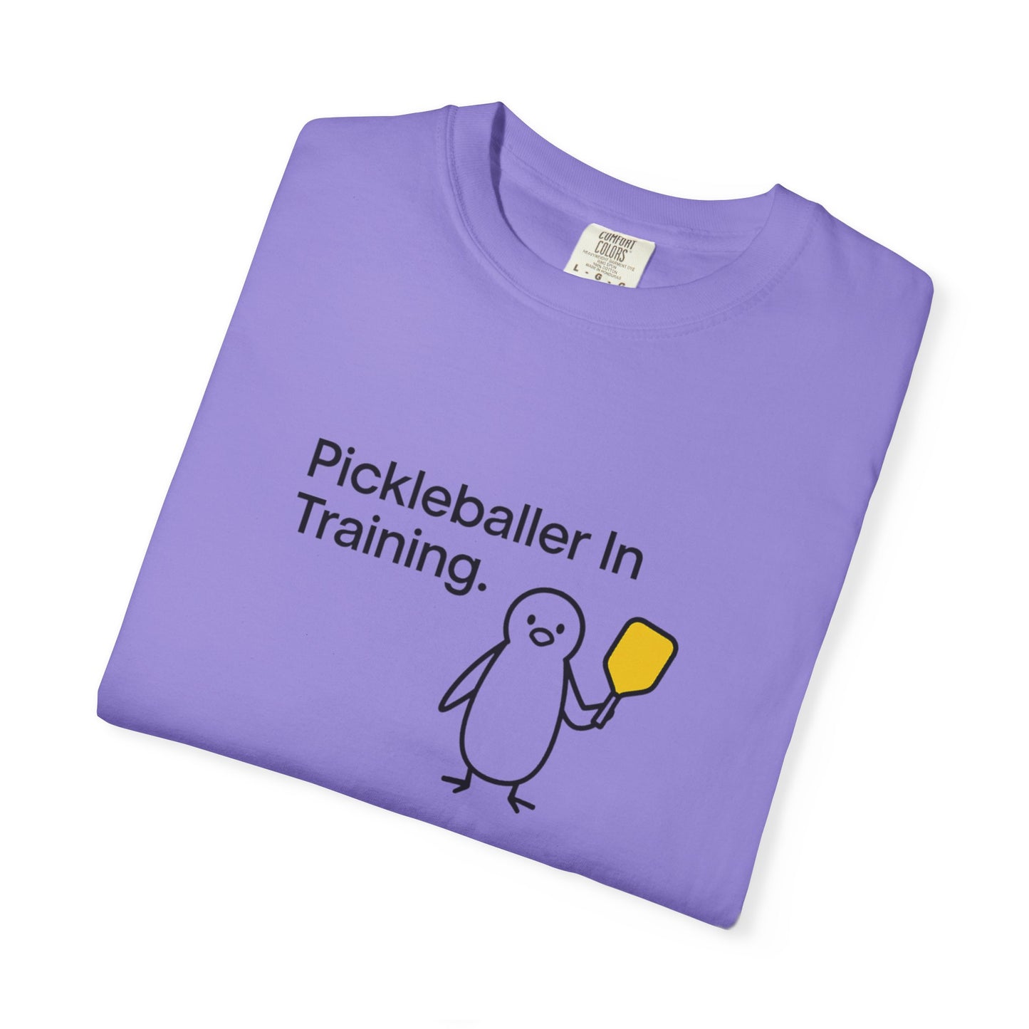 Pickleballer in Training T-Shirt | Cute Penguin Holding Paddle Design