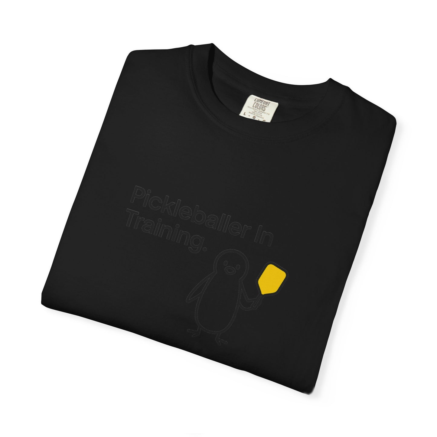 Pickleballer in Training T-Shirt | Cute Penguin Holding Paddle Design