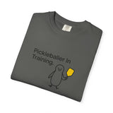 Pickleballer in Training T-Shirt | Cute Penguin Holding Paddle Design