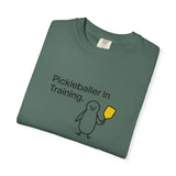 Pickleballer in Training T-Shirt | Cute Penguin Holding Paddle Design