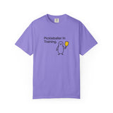Pickleballer in Training T-Shirt | Cute Penguin Holding Paddle Design