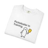 Pickleballer in Training T-Shirt | Cute Penguin Holding Paddle Design